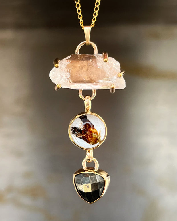 Cascading quartz point, flower terrarium, and pyrite necklace in 14K gold-fill