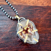 Desert Flower quartz terrarium necklace in silver, brass and gold