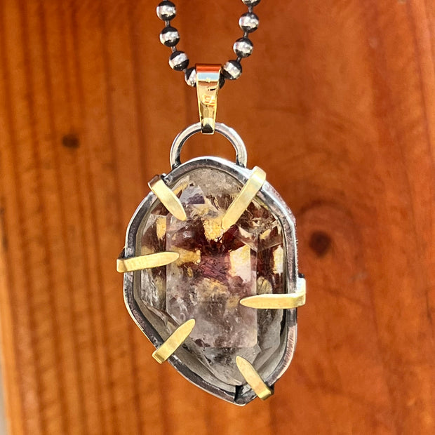 Desert Flower quartz terrarium necklace in silver, brass and gold