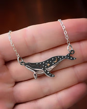 Whale necklace in silver and bronze