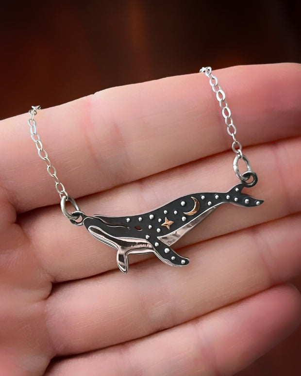 Whale necklace in silver and bronze