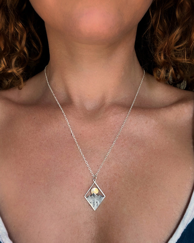 Made-to-order mountain & moon necklace in silver and bronze