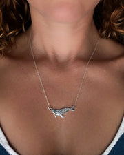 Whale necklace in silver and bronze