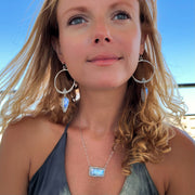 Hand-stamped silver hoops with moonstone dangles