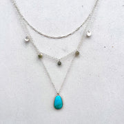 Large layered necklace set in silver