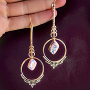 Small pendulum earrings with diamond-shaped Mexican opals
