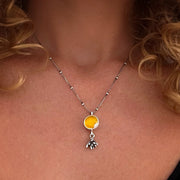 Yellow flower terrarium necklace with succulent dangle