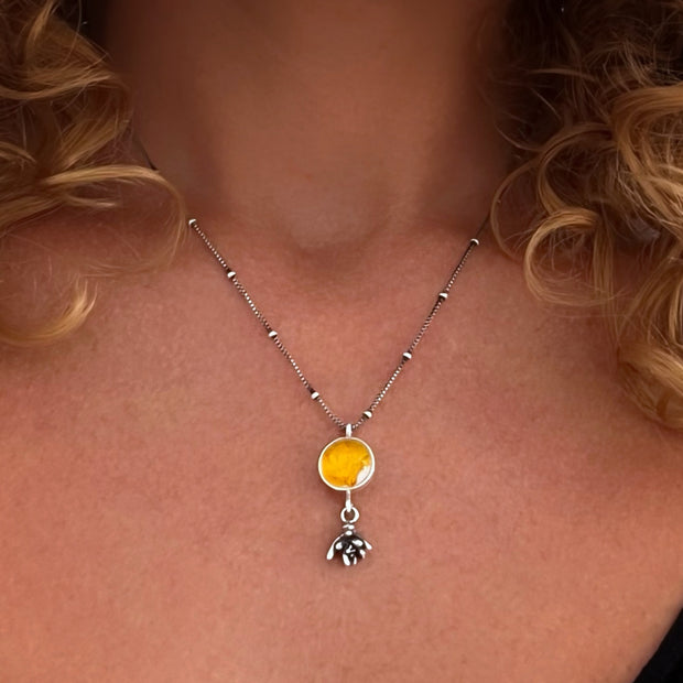 Yellow flower terrarium necklace with succulent dangle