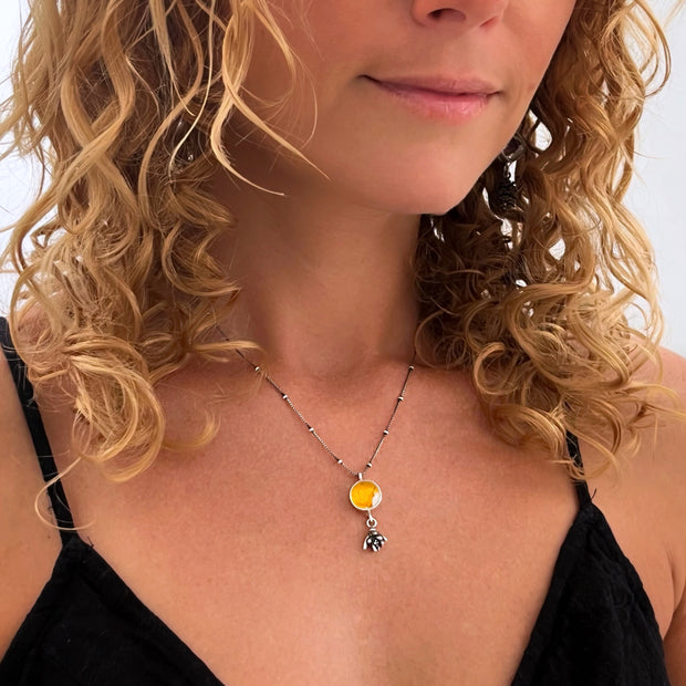 Yellow flower terrarium necklace with succulent dangle