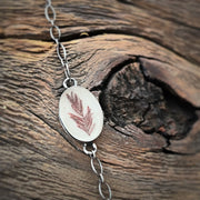 Ceramic wood necklace with red fern terrarium