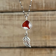 Red flower terrarium necklace with leaf dangle