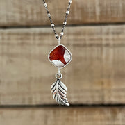 Red flower terrarium necklace with leaf dangle