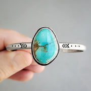 Hand-stamped turquoise cuff in silver