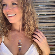 Cascading amethyst point, moonstone, and opalized petwood necklace in silver