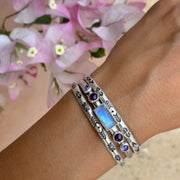 Hand-stamped cuff set with moonstone, amethyst & tanzanite