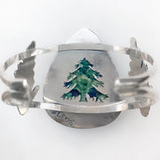 Opalized rhyolite cuff with cedar leaves and pine tree cut-out