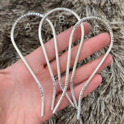 Stamped silver hair forks