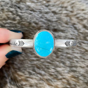 Stamped silver stacking cuff with repaired turquoise